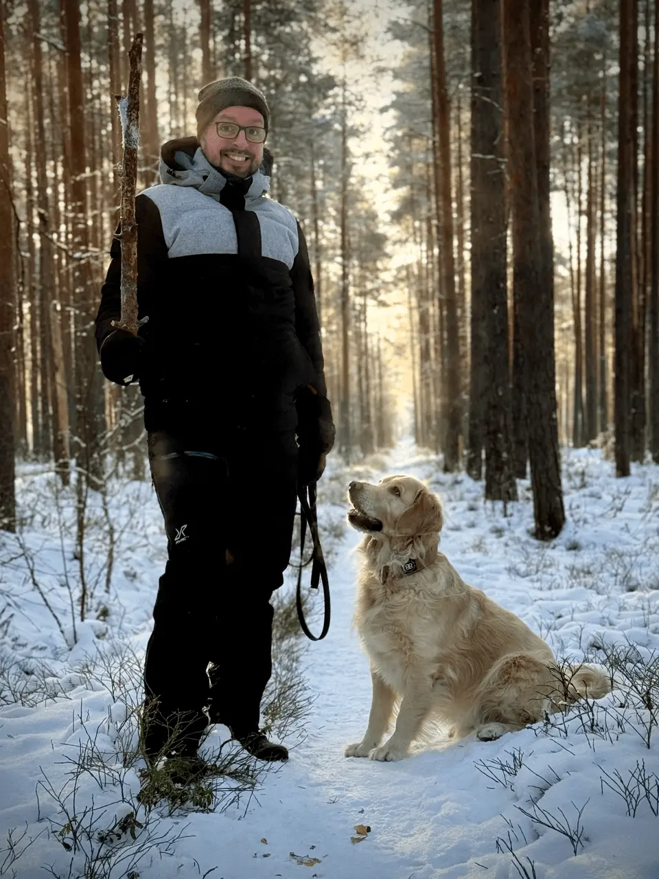 Jeremy outdoors with his Golden Retriever